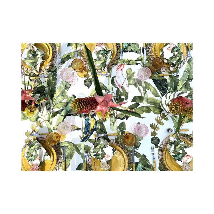 Amazonas 59x106.2 inch tablecloth, featuring a bold and vibrant artistic pattern, draped over a dining table