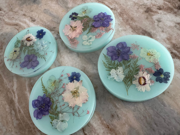 Blue resin round coasters set of 4. Adds a touch of spring and keep forever.