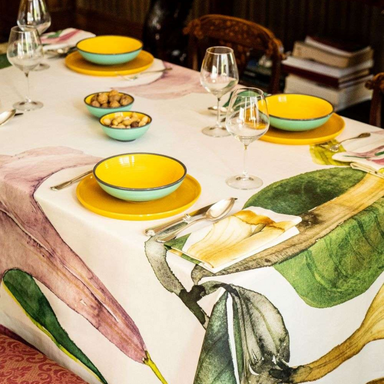 Datura 87x87 inch tablecloth, featuring a bold floral print on a high-quality fabric, displayed on a dining table