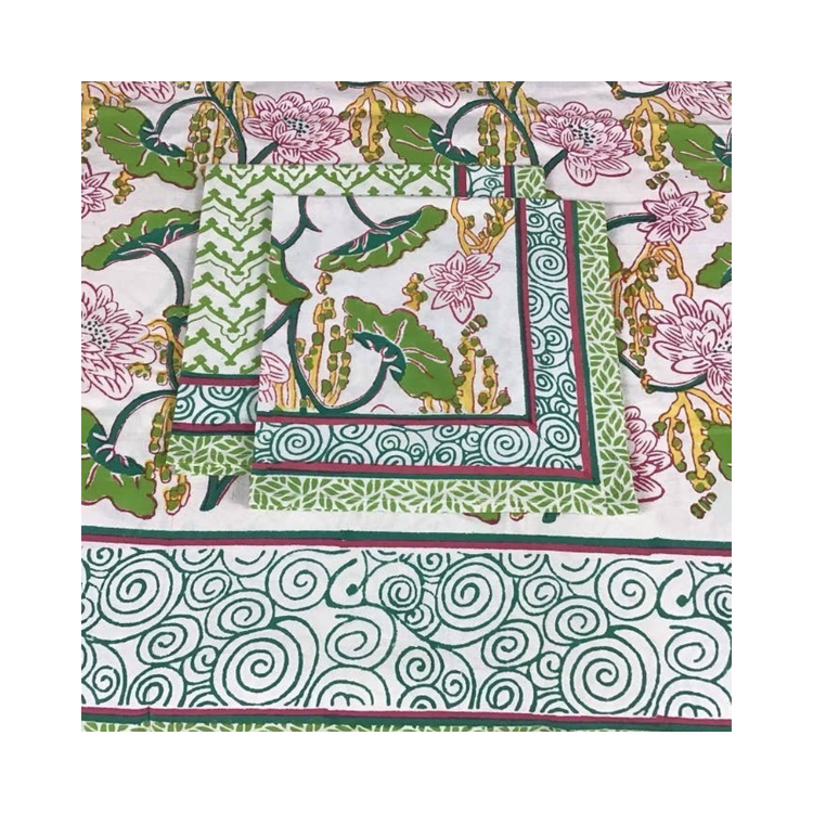 Climbing Lotus Pink 60x120 inch tablecloth, handblock printed with a floral design, covering a long table