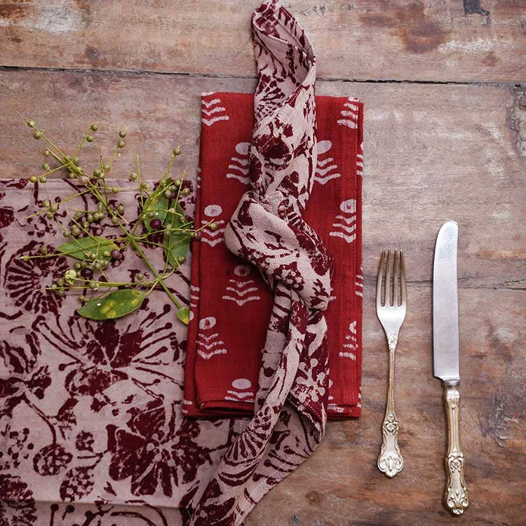 Holiday Red Floral Block Print Napkins shown with table cloth