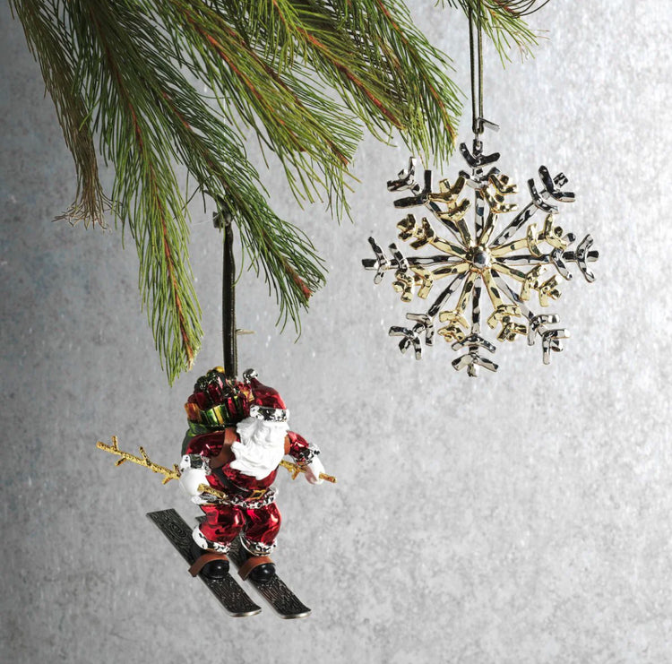 Michael Aram skiing Santa ornament, metal with fun design, for festive decoration