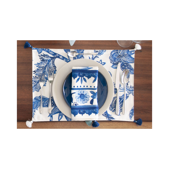 Coastal Chic Table Setting Costa blu placemats, set of 8, laid out on a dining table, showcasing a coastal inspired design