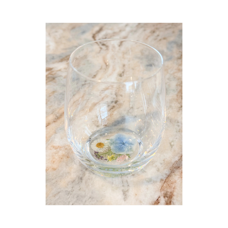 Crystal flower stemless wine glass made with real flowers in resin for an elegant sip. Perfect for spring summer soirees.