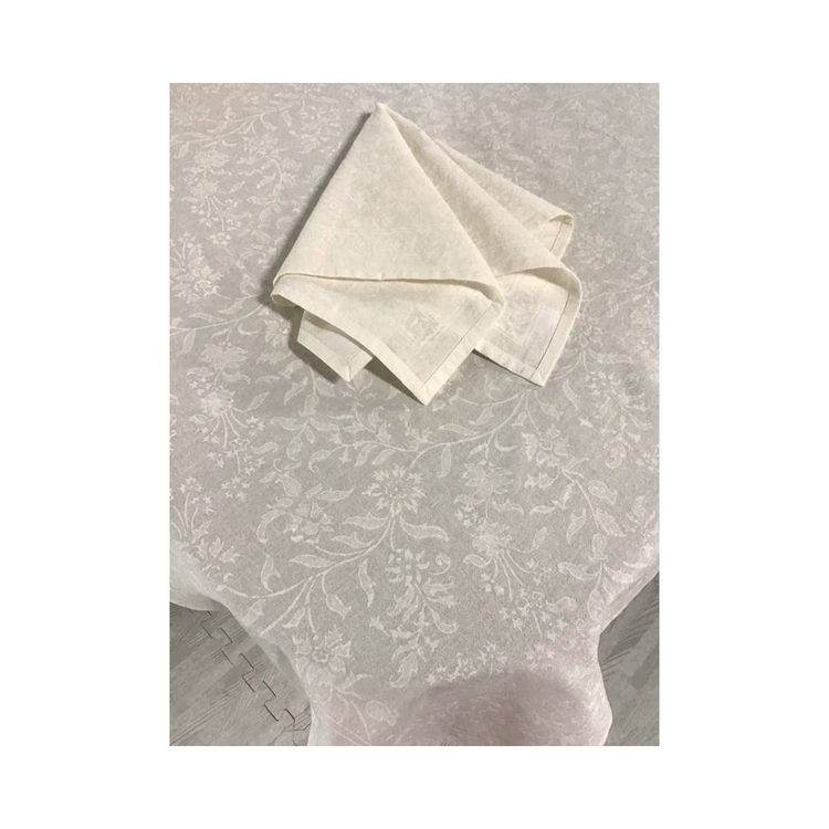 Adorn White on White 86inch round tablecloth. Subtle textured design, sustainable fabric. Elegant and versatile. Textural whites