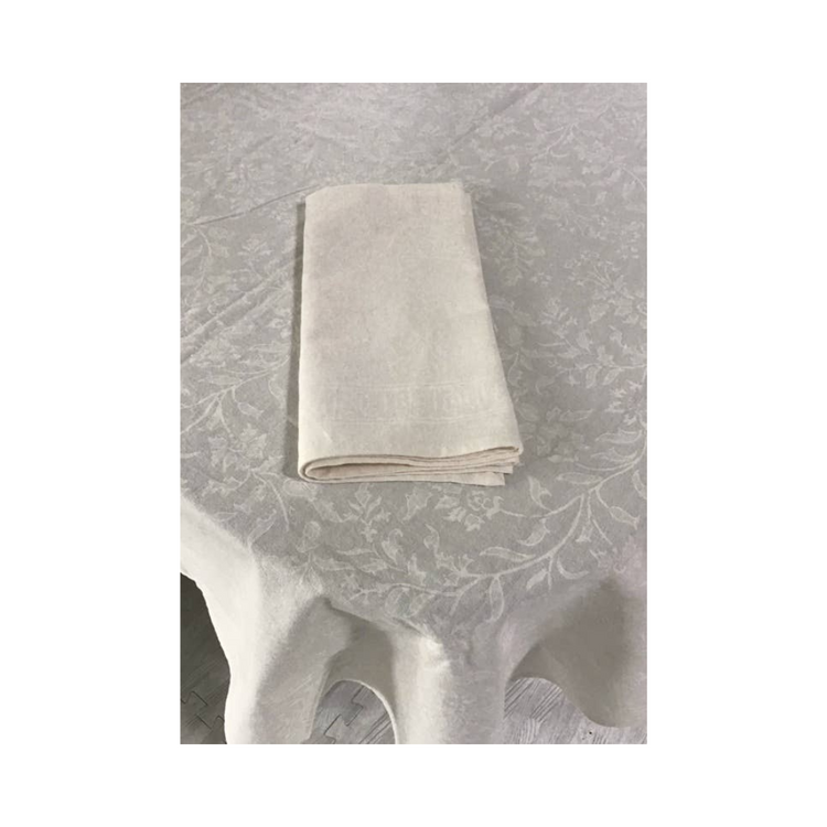Adorn White on White 86inch round tablecloth. Subtle textured design, sustainable fabric. Elegant and versatile. Textural whites