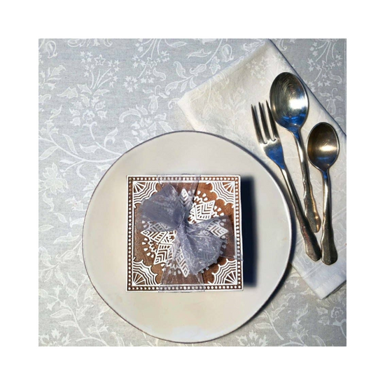 Adorn White on White 86inch round tablecloth. Subtle textured design, sustainable fabric. Elegant and versatile. Textural whites